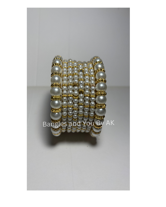 Elegant White Pearl and Gold Bangle Set